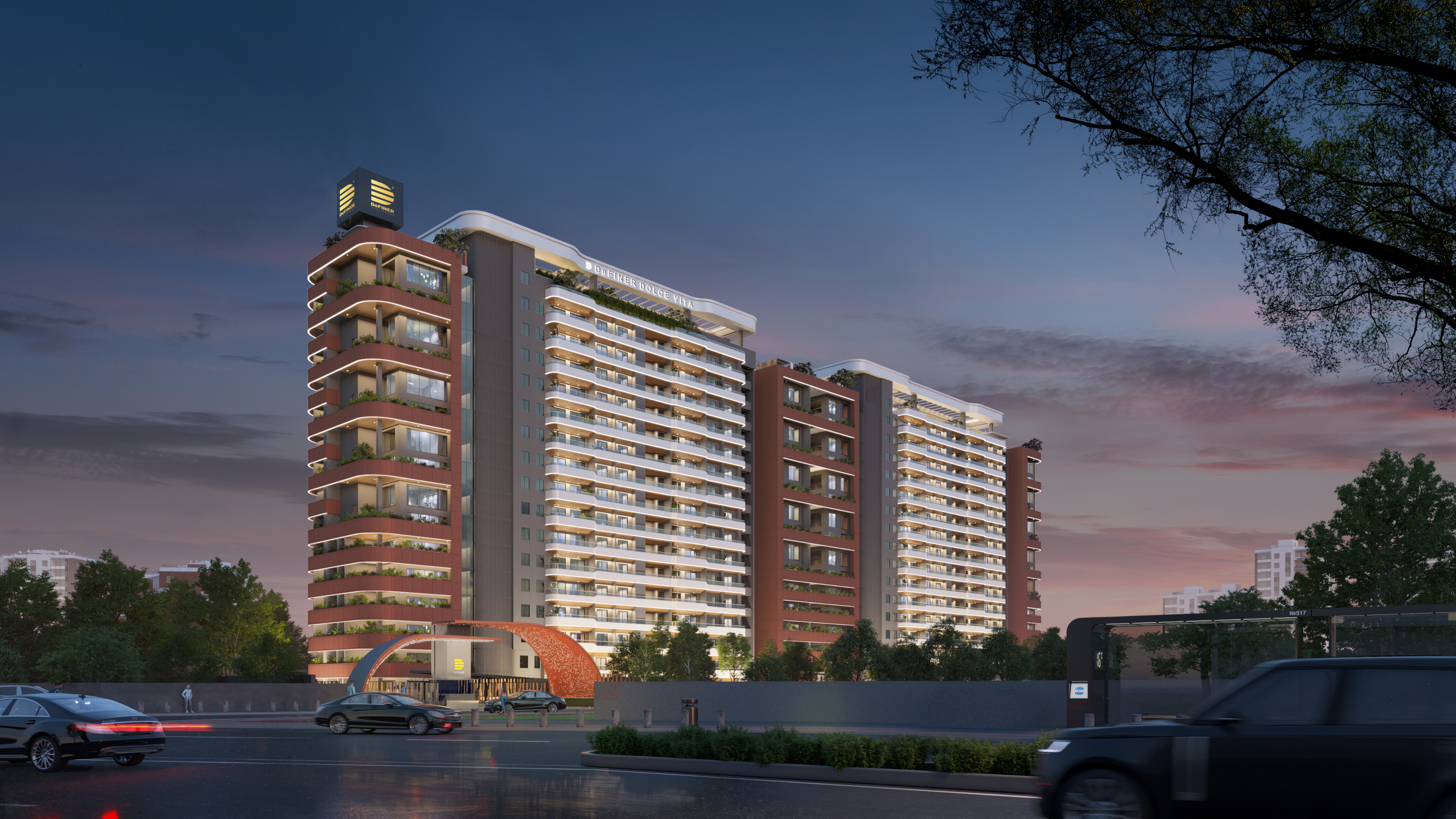 image of two modern high rise residential towers with clean roads, cars, and setting sun in background